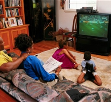black family watching tv